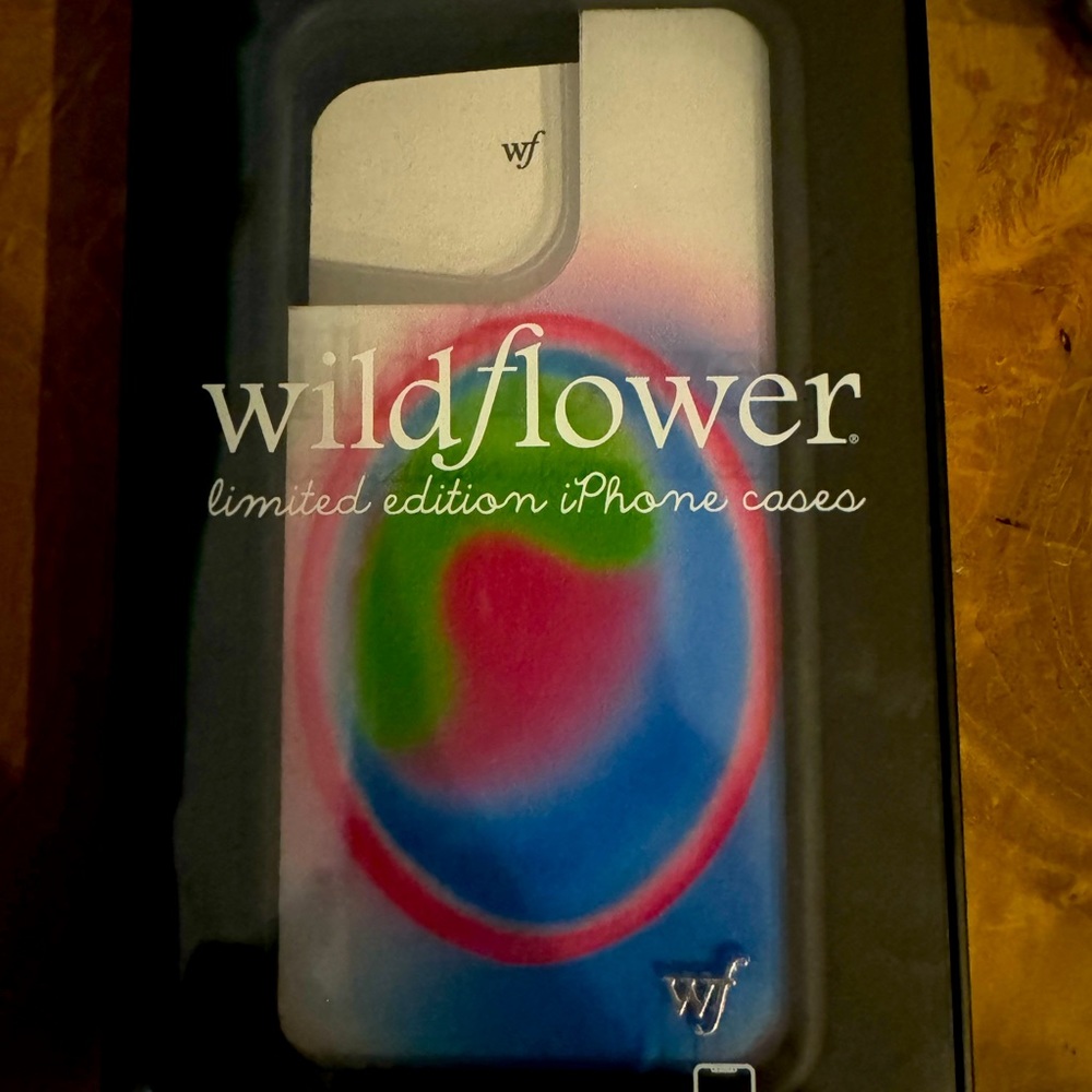 Brand new “Aura” iPhone 13 Pro Wildflower phone case. In box, never used.